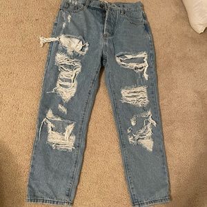 ripped blue jeans size medium